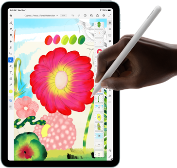 iPad Air, hand using Apple Pencil Pro to draw a colorful image of a flower on the Adobe Fresco app